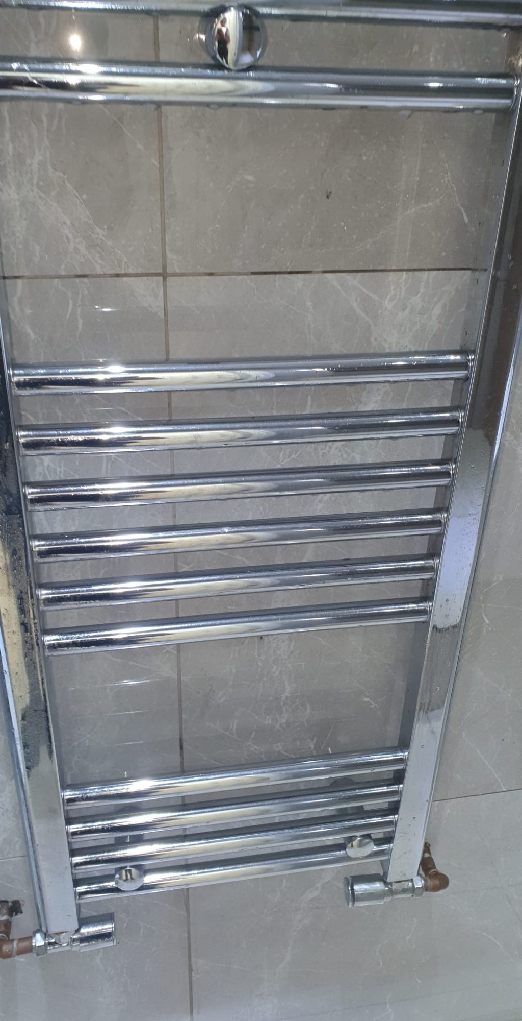 Towel dryer cleaned, polished, and shiny again