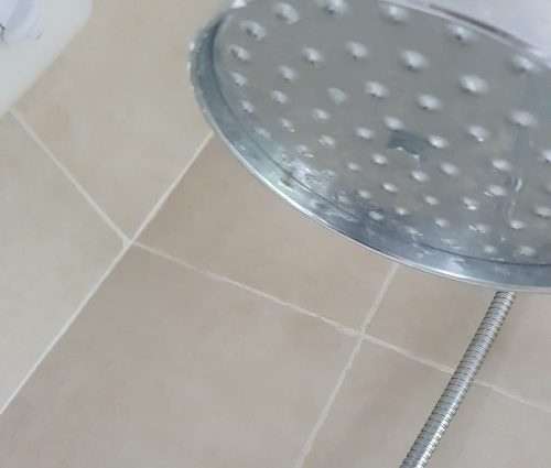 Shower heads steam cleaned and disinfected